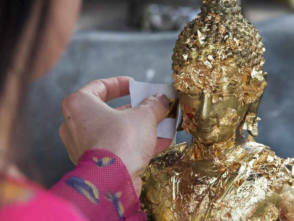Religious Gold Leaves Statue